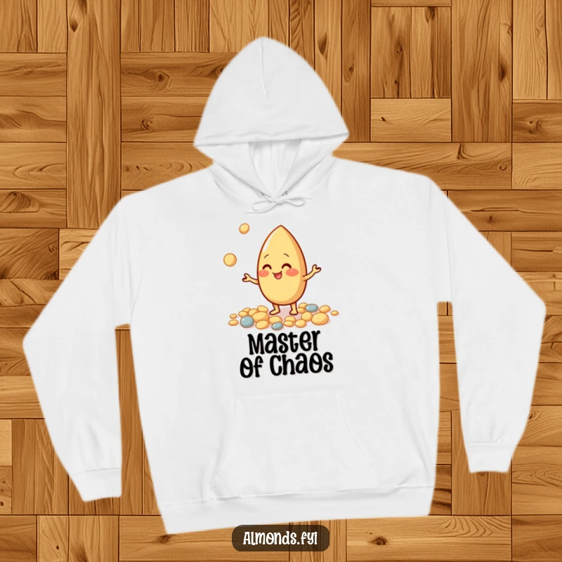 Funny hoodie with a giggling almond character juggling small pebbles, perfect for staying warm and cheerful.