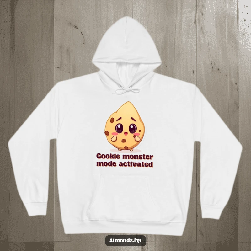 Funny hoodie with a surprised almond character looking incredulously at a giant cookie, capturing a moment of sweet astonishment.