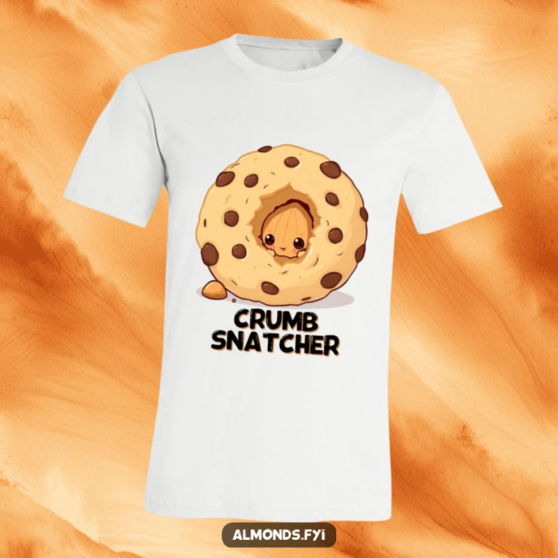 Funny t-shirt showing a curious almond character peeking from behind a massive cookie crumb, with wide eyes and a mischievous grin.